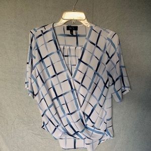 Blue and white wrap around blouse